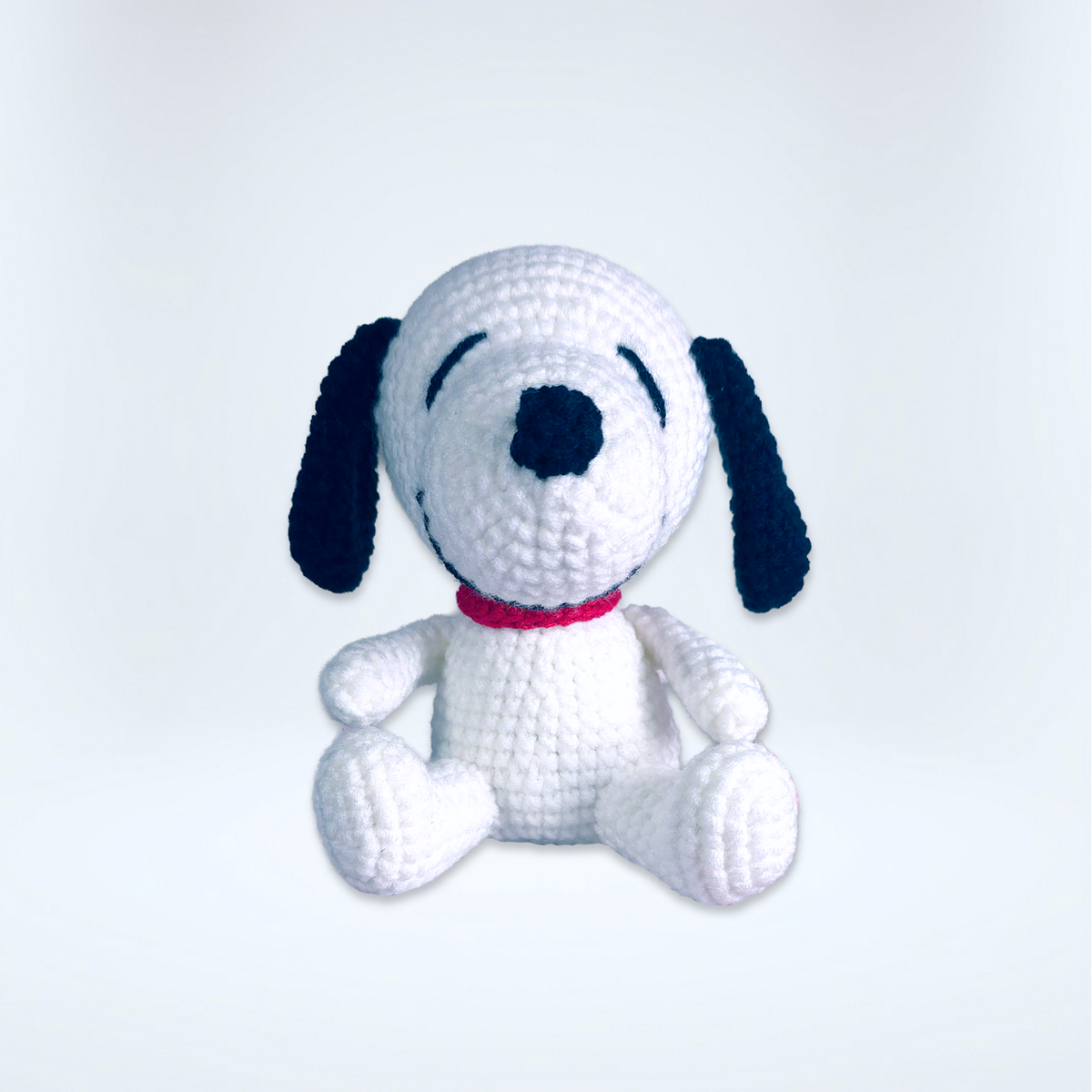 Figura tejida inspirada en Snoopy